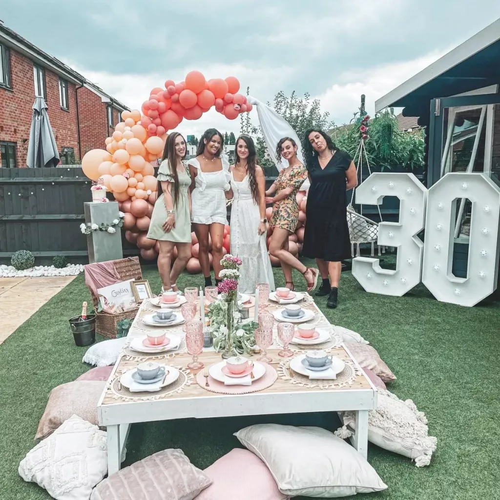 Beautiful girls enjoying a 30th birthday with a luxe picnic in Hertfordshire. Event Hire and styling.