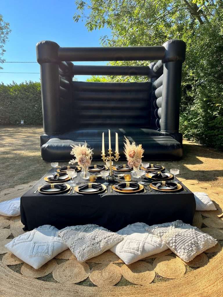 Black Bouncy Castle with Black and Gold Luxury Picnic
