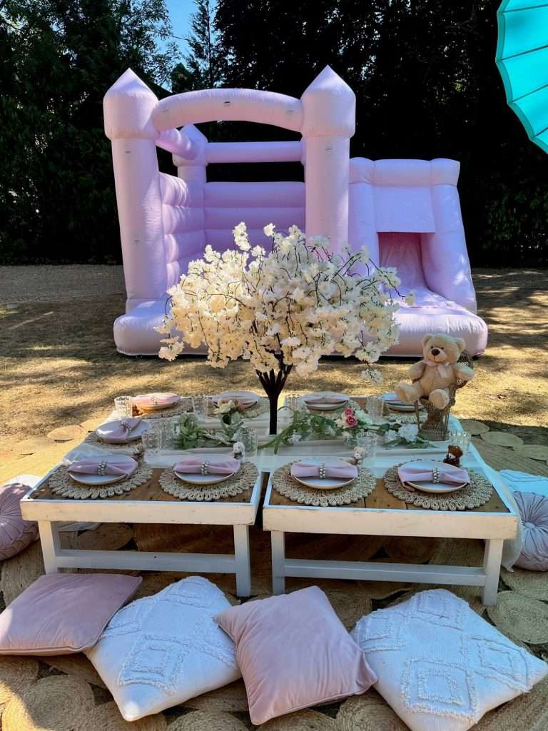 Pastel Pink Bouncy Castle and Blush Pink Picnic with Teddy Bear